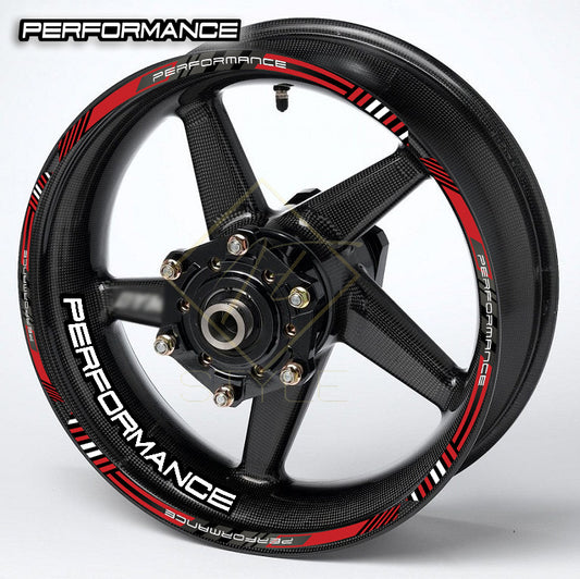 Motorcycle wheel with 'Performance' branding on a white background
